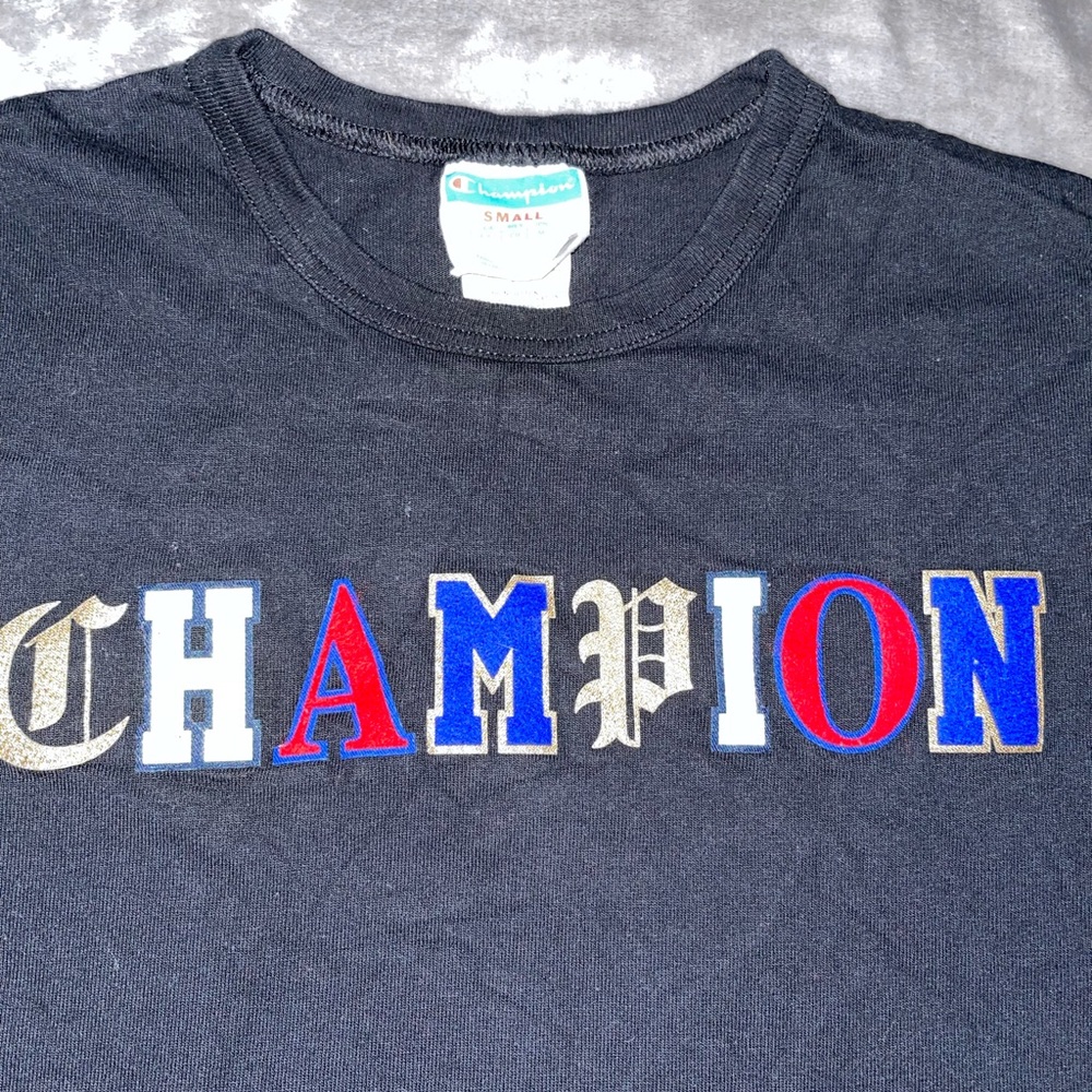 Champion Tee